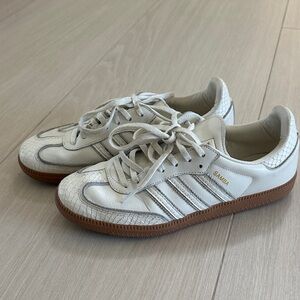 White and Brown Sneakers with Gold Accents